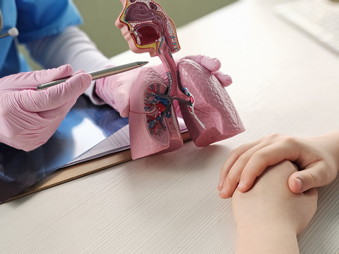 Doctor and patient looking at diagram